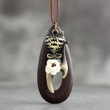 brown meow necklace hanging