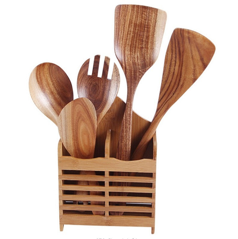 wood spoons in holder