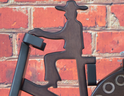 wood tricycle bottle display driver close up